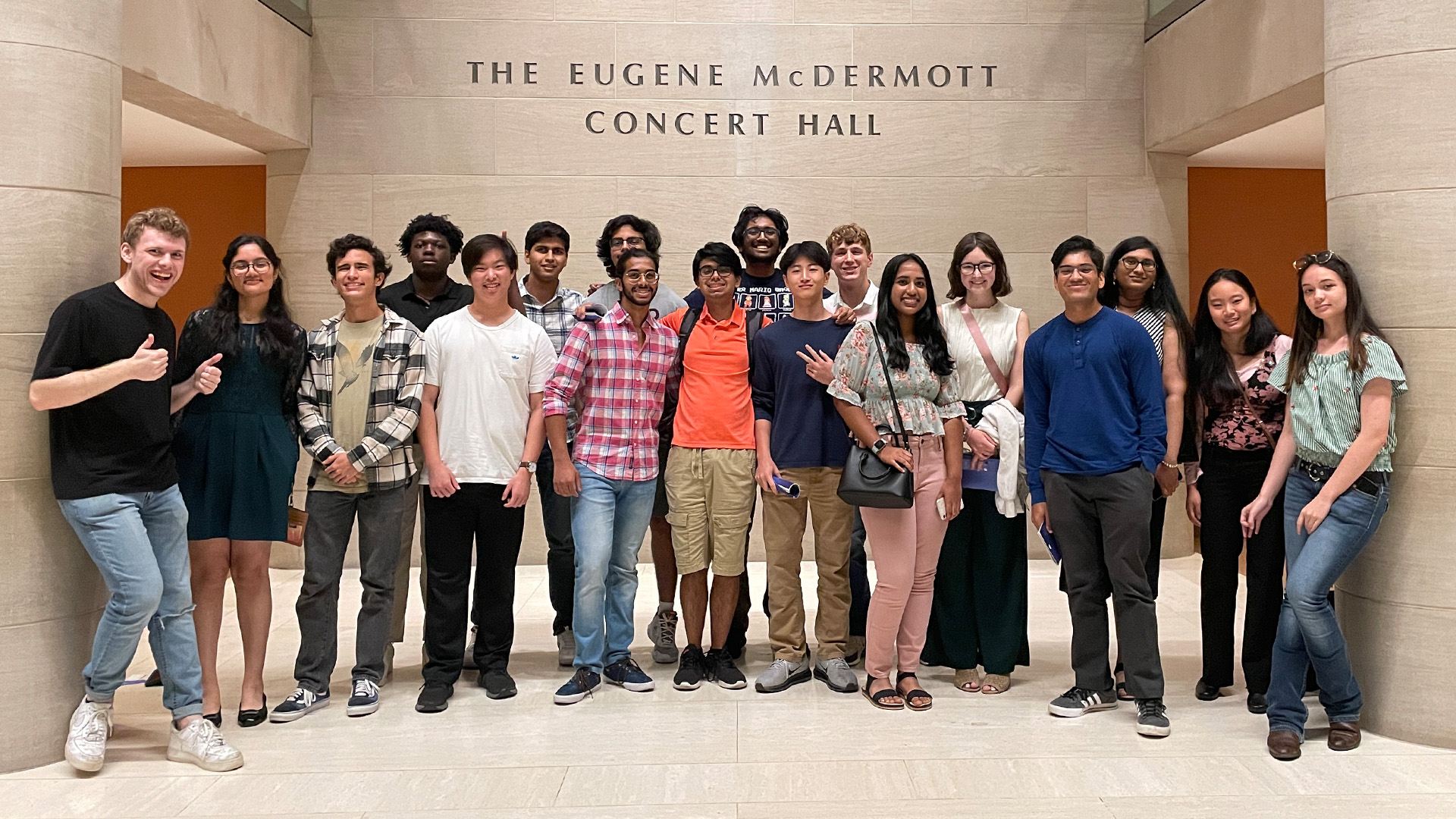 Honors College students stand in front of the Eugene McDermott Concert Hall at the Meyerson Symphony Center. 
